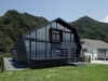 wood-and-glass-house-with-ocean-and-mountains-for-neighbors-1